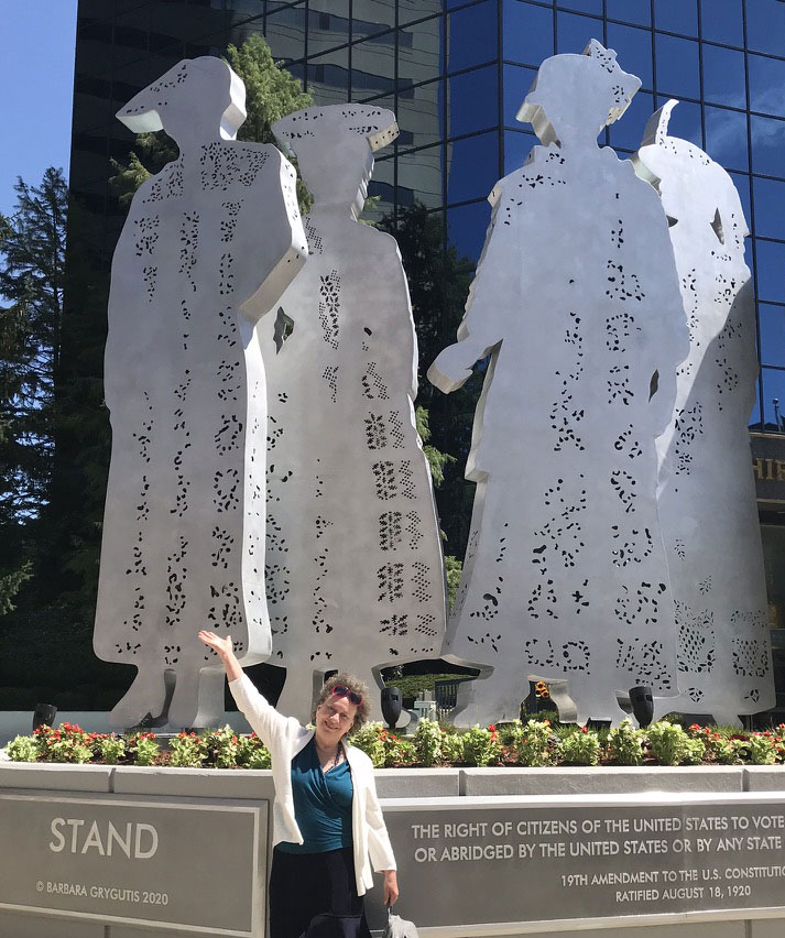 Meriah in front of Stand sculpture Meriah in front of Stand sculpture